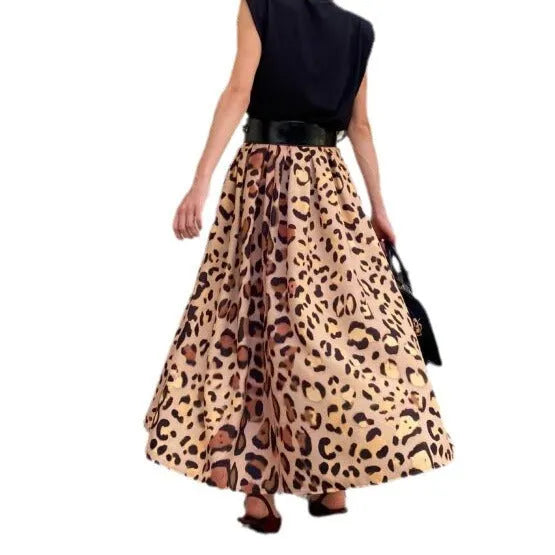Women's long brown leopard print A-line skirt with a big hem.