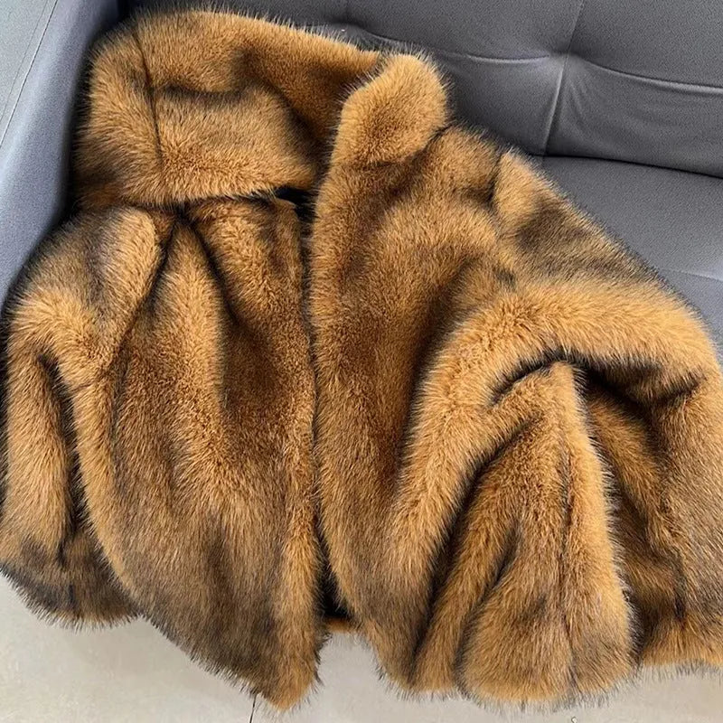 Silver grey loose artificial fur coat for women shown at mid-length