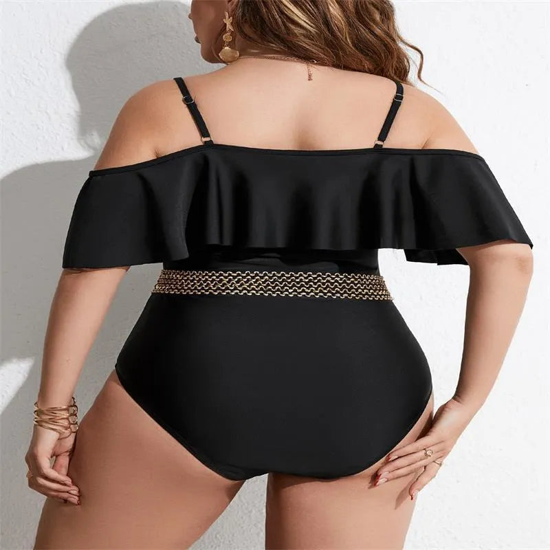Black solid colour one-piece swimsuit for women in plus sizes on a mannequin.