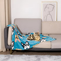 Blue cartoon dog pattern double-sided pet blanket shown on a dog bed, with size options 60x80cm, 100x120cm, 100x150cm.