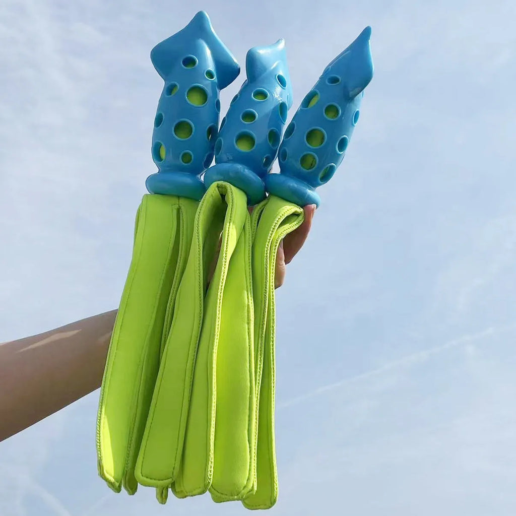 Blue cuttlefish-shaped dog chew toy with squeaky sound device for interactive play