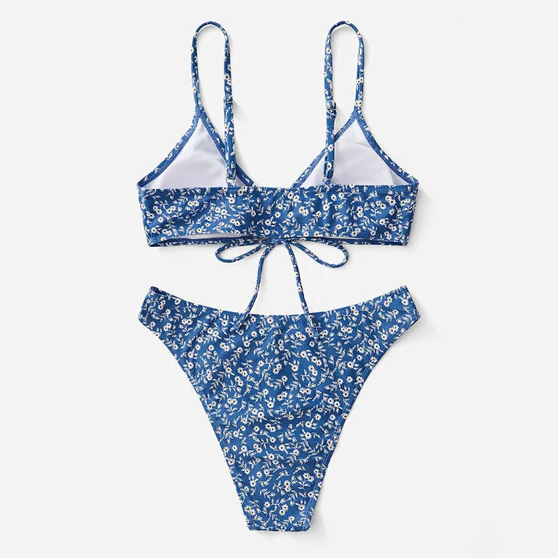 Blue women's three-piece swimsuit set without steel rings, shown with top and shorts.