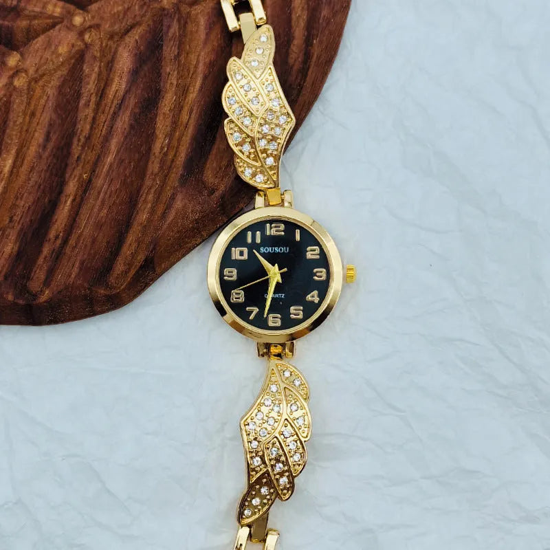 Stainless steel women's watch with round dial available in gold, white or black surface colours