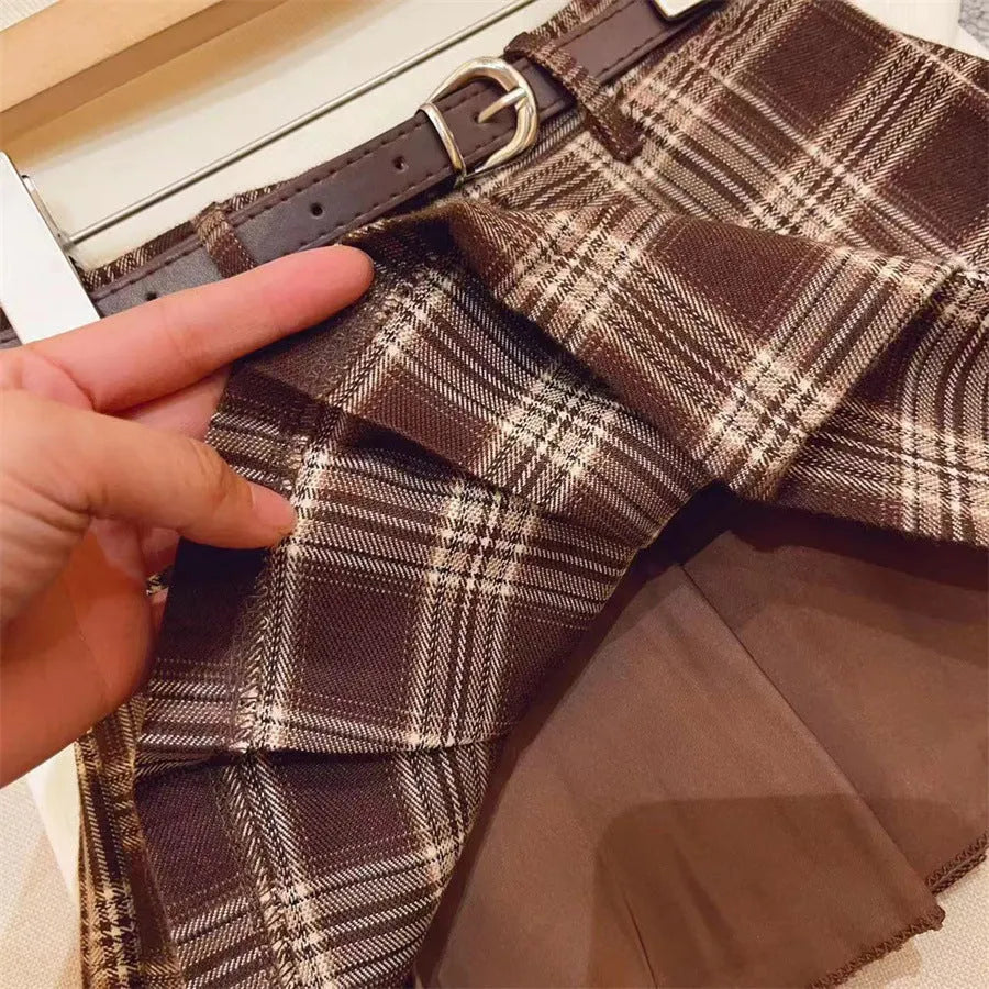 Children's cotton plaid pleated skirt with A-line silhouette shown on mannequin