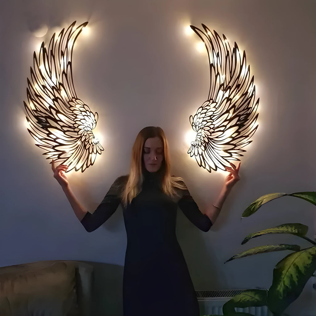Carved metal wall decor with light, angel wings design, double-sided black iron, 35cm pair on a wall