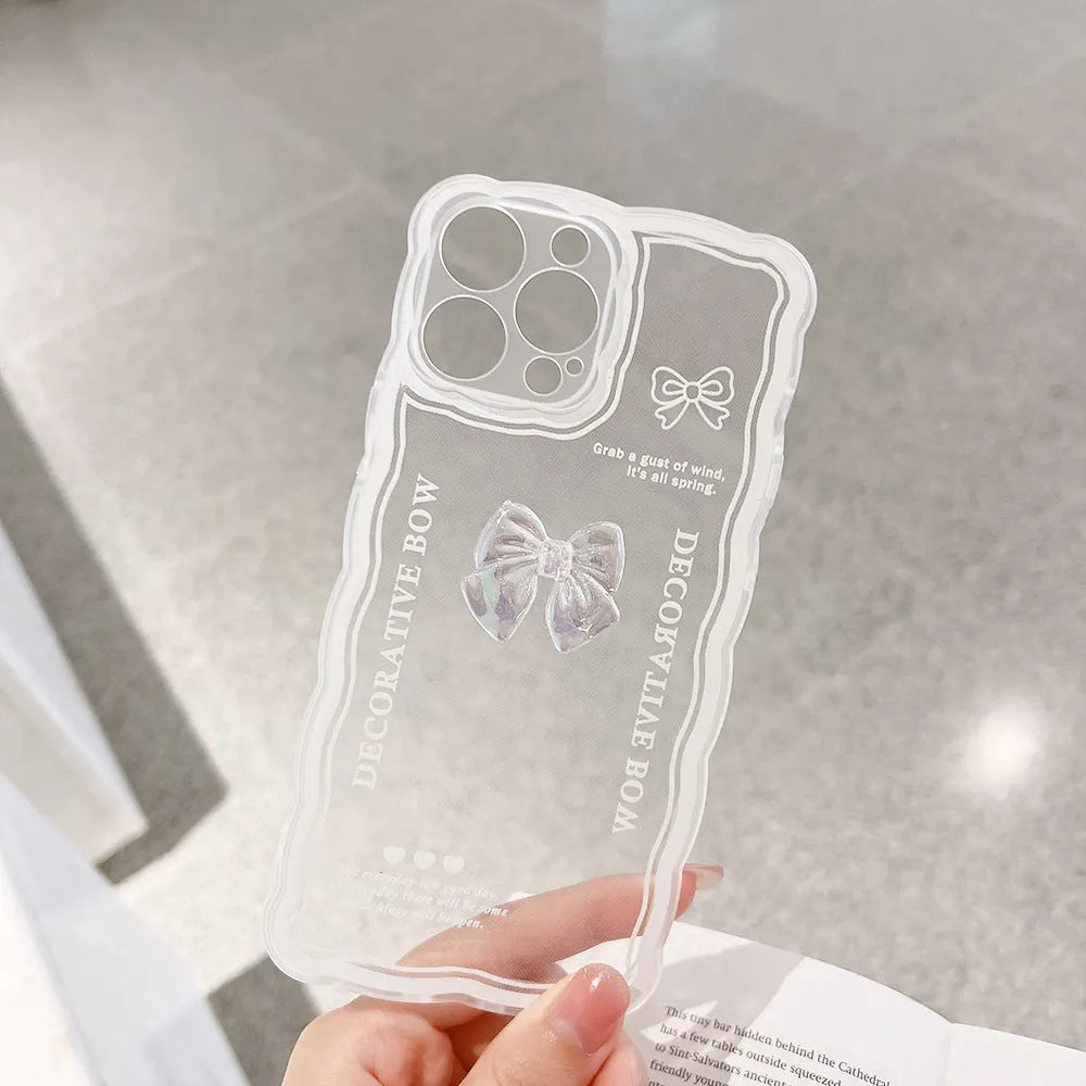 Transparent iPhone case with a raised 3D ice-through bow design on a white background.