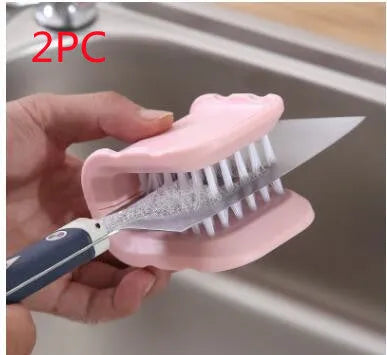 Blue U-shaped plastic brush with bristles for cleaning knives and cutlery in a kitchen.