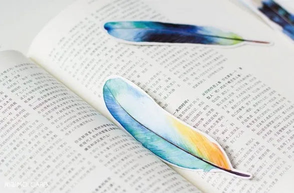 Creative paper feather bookmark 30 piece set, 4.5 x 15.5cm, multi colour, on a white background.