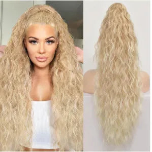 Long curly synthetic ponytail wig in high temperature fibre, 30 inches in length.