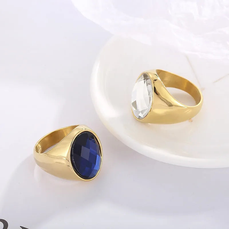 Retro titanium electroplated stainless steel geometric women's ring on white background