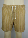 Men's navy blue and grey striped beach shorts with straight legs and built-in lining, laid flat.