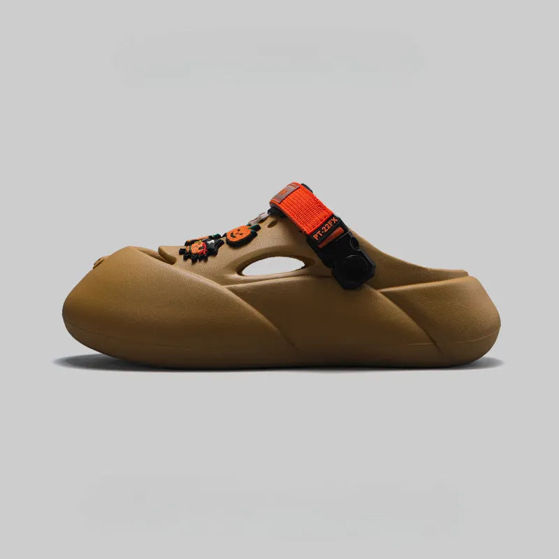 Men's grey EVA sole beach hole shoes on a sandy background