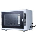 Small silver UV steriliser unit with a stainless steel interior for salon tool hygiene.