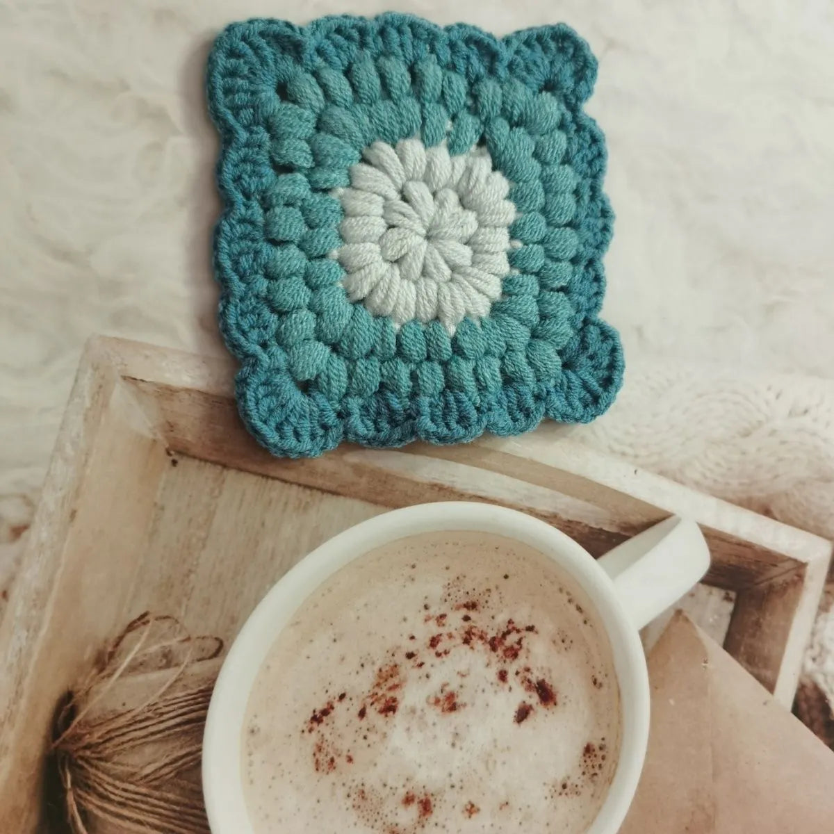 Crocheted wool insulated cup placemat with grandmother lattice pattern in colour choice