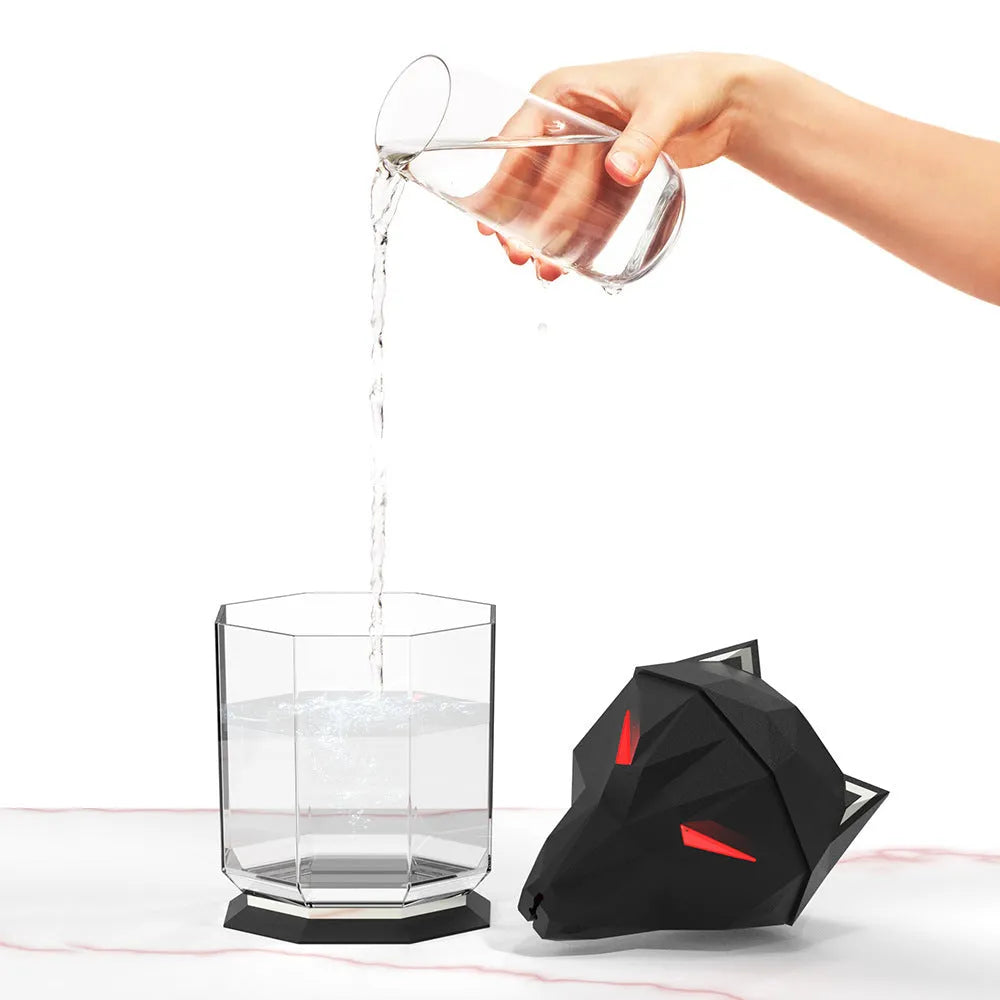 Chrome-plated ultrasonic desktop humidifier with coloured LED lights and USB cable.