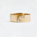 Gold electroplated copper women's ring with zircon stones showing UK size markings 6-10