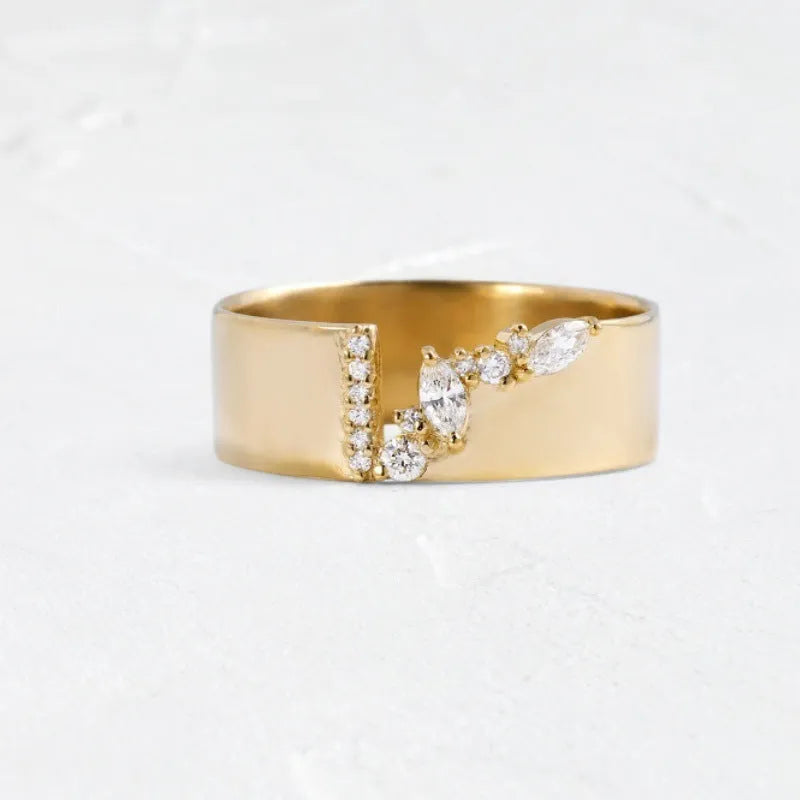 Gold electroplated copper women's ring with zircon stones showing UK size markings 6-10