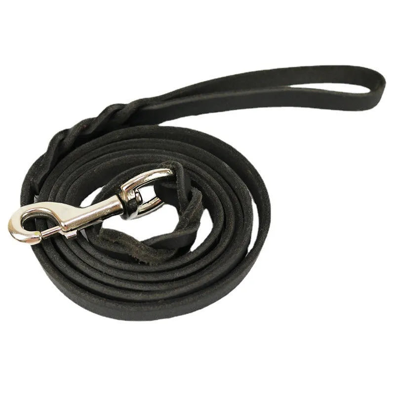 Thickened brown cowhide dog walking rope held in a hand, showing its length and simple strip design.