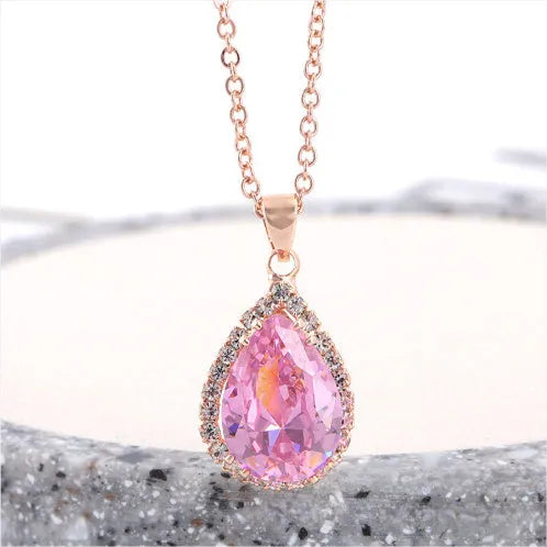 Rose gold geometric water drop pendant necklace with rhinestone inlay