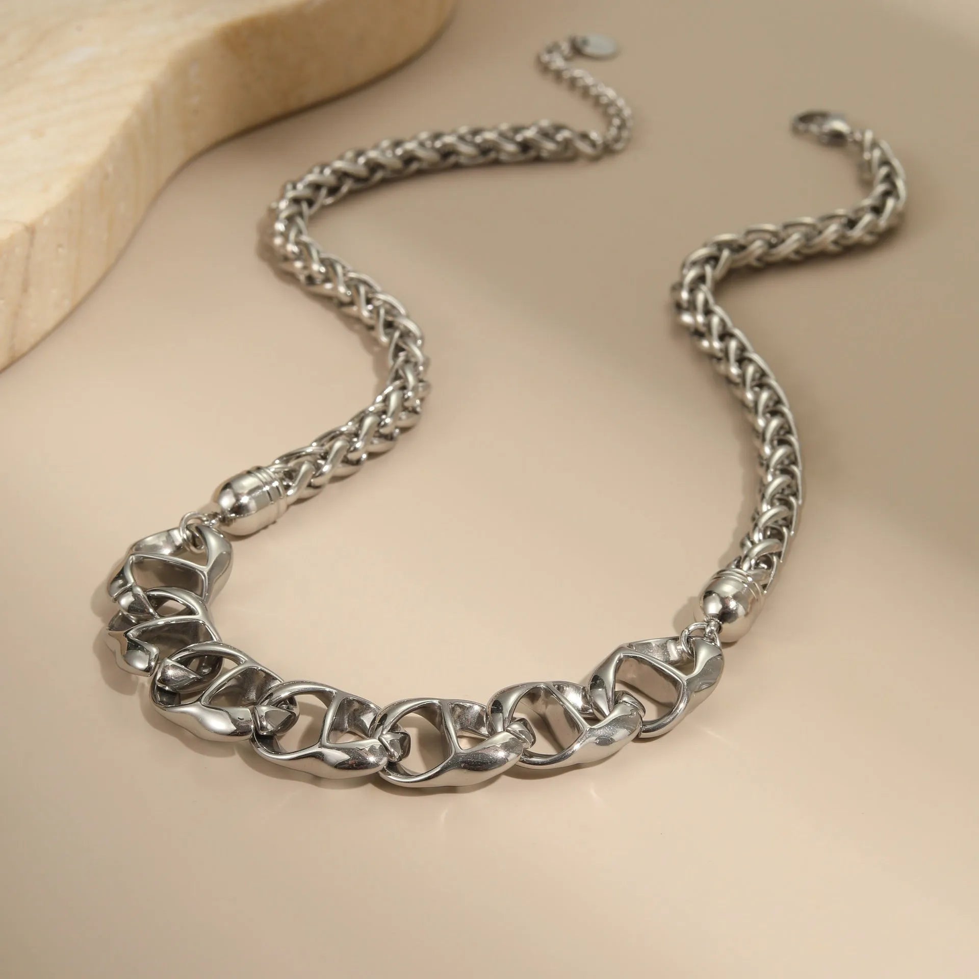 Stainless steel necklace with geometric pendant and 18K gold plating in gold or steel colour options