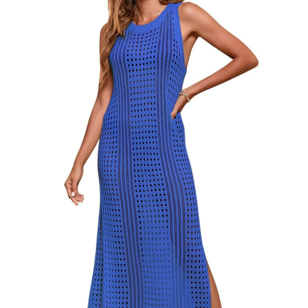 Long loose solid colour beach cover-up blouse with hollow-out knitted design on a hanger.