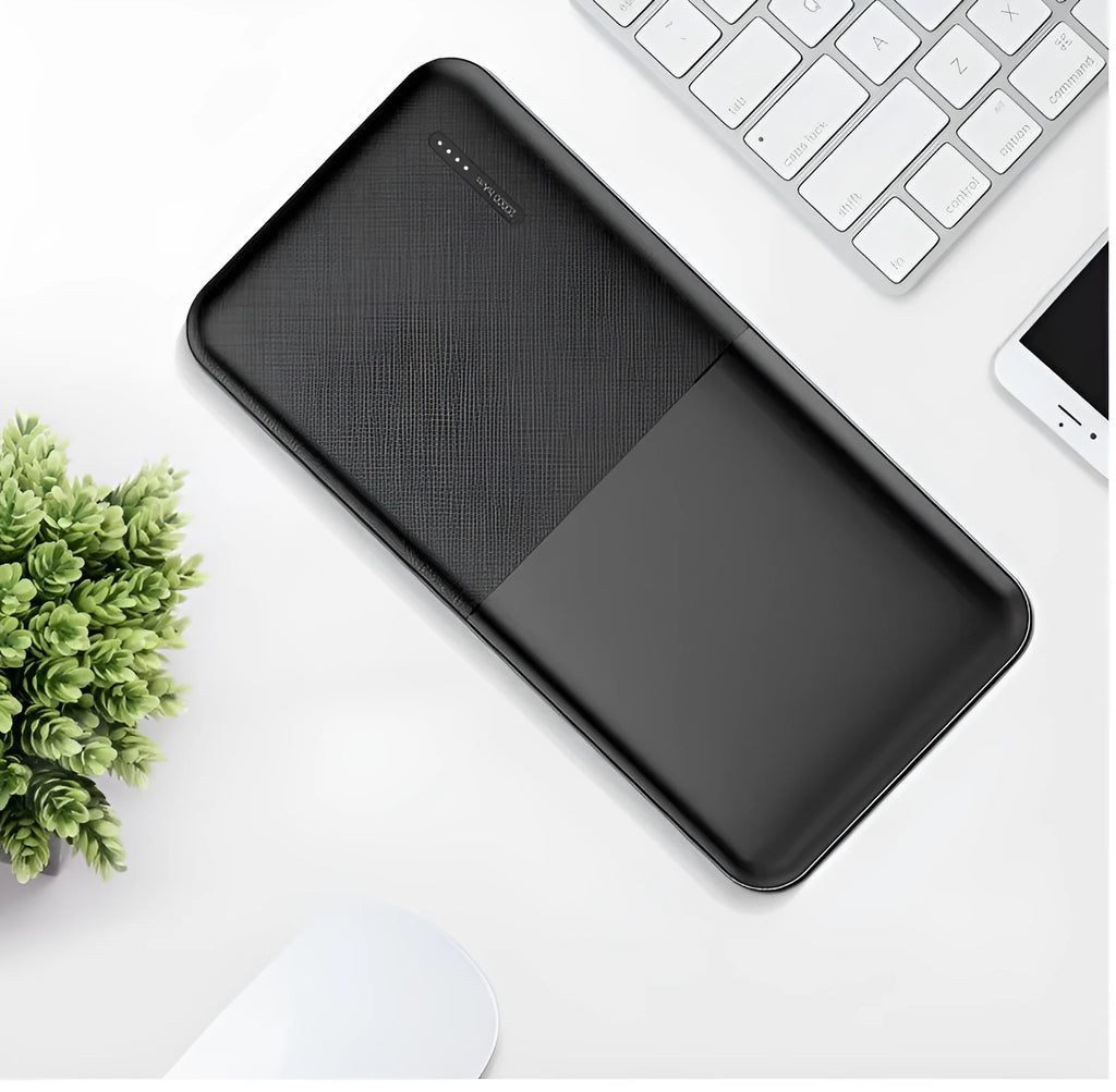 20000 mAh portable power bank with multiple USB ports in black or white colour measuring 140x69x26mm