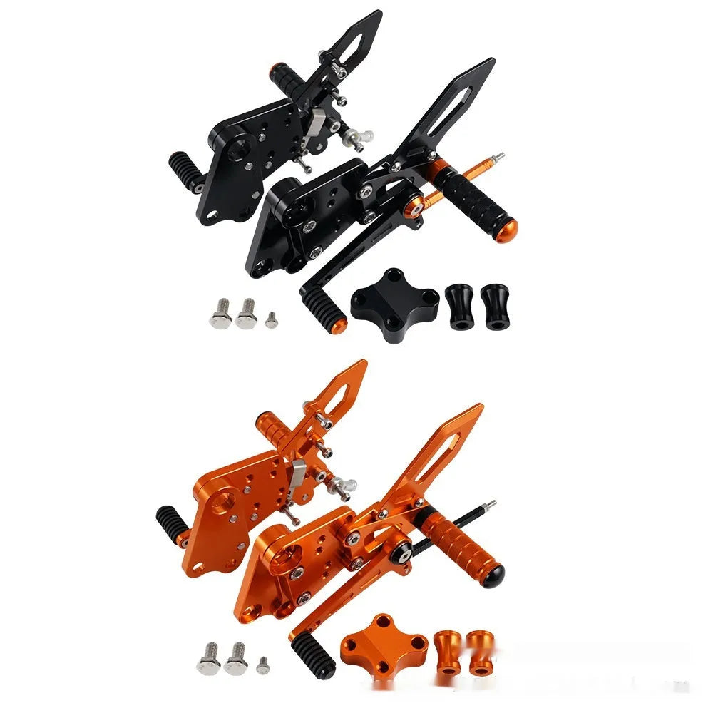 KTM Duke motorcycle raised footpeg support assembly in black and orange colours