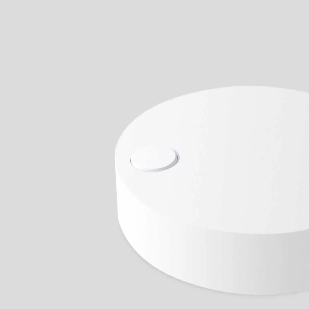 Compact white selfie fill light for mobile phones with three-level dimming switch and USB charging port.