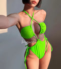 Women's black one-piece swimsuit with a front drawstring detail on a mannequin.