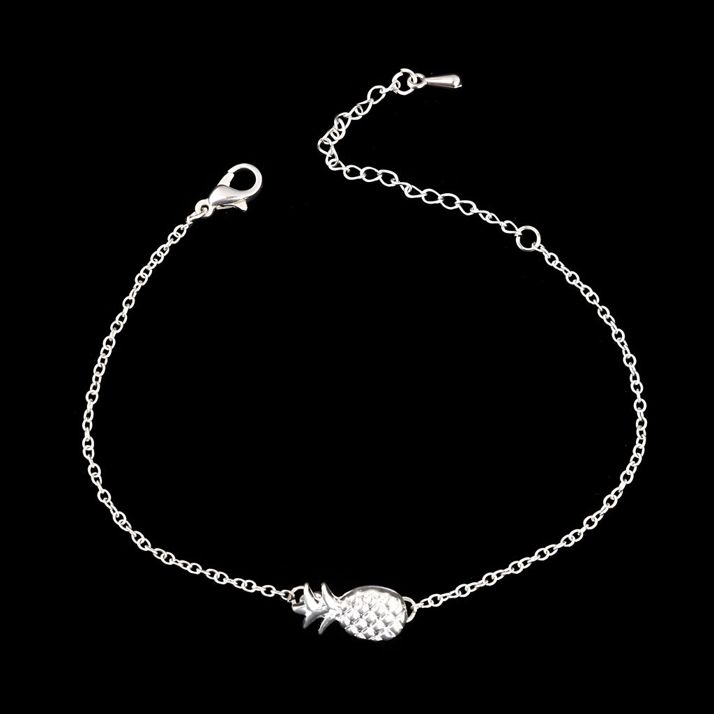 Close-up of a women's alloy bracelet featuring a detailed pineapple charm in gold or silver colour.