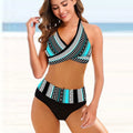 Ladies striped tie-dye bikini set with hollow back and high-waisted briefs on a mannequin.