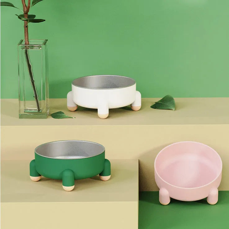 Green stainless steel pet food bowl with high foot and non-slip anti-overturn base.