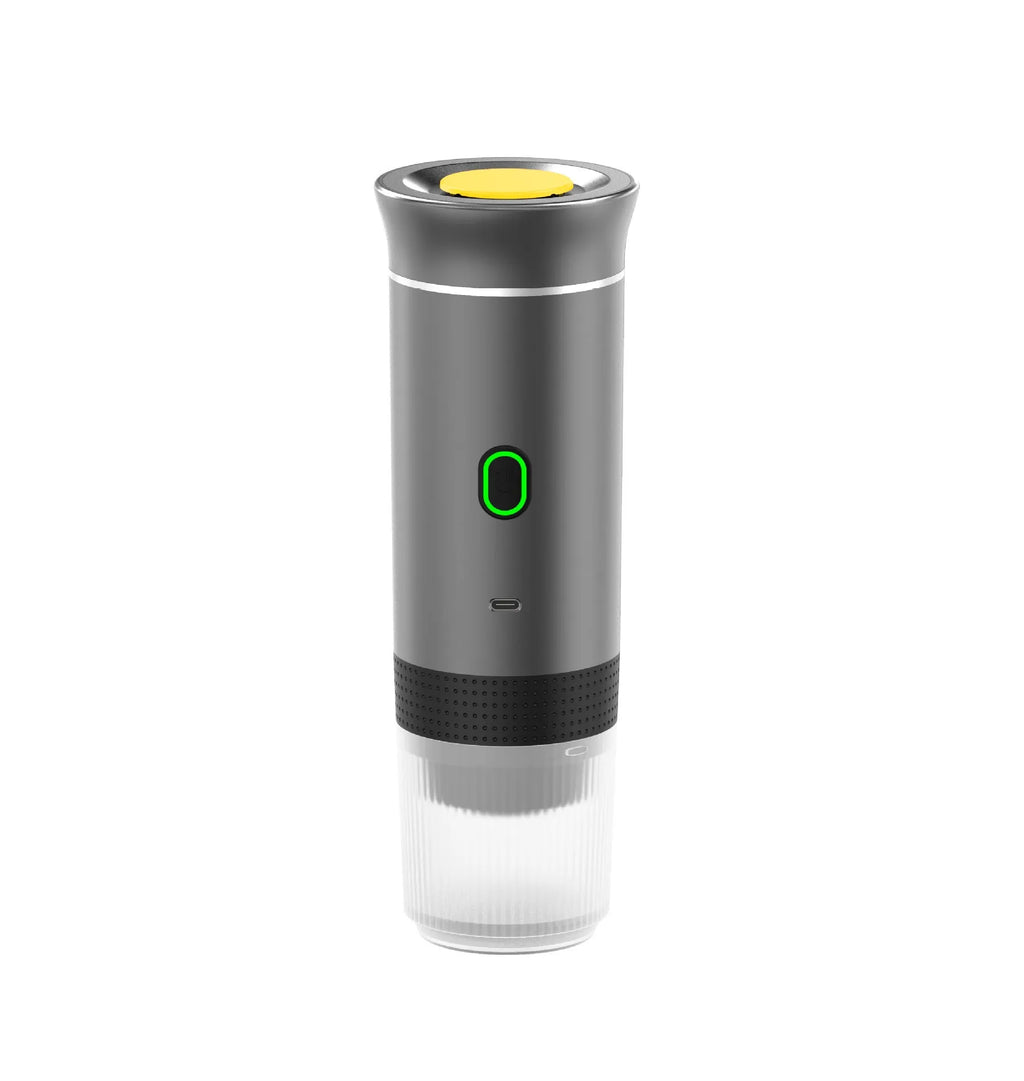 White portable espresso machine with grinder, showing capsule compartment and USB charging cable