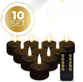 Four matte black LED tealight candles showing height and diameter next to a measurement ruler.