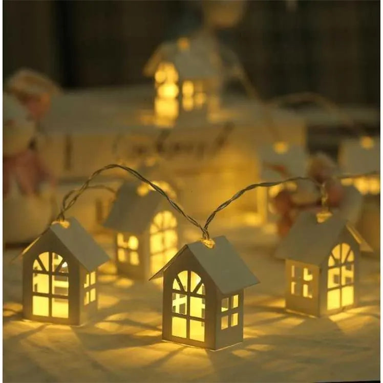 10 LED wood house fairy light string 2M with warm white glow on a Christmas tree
