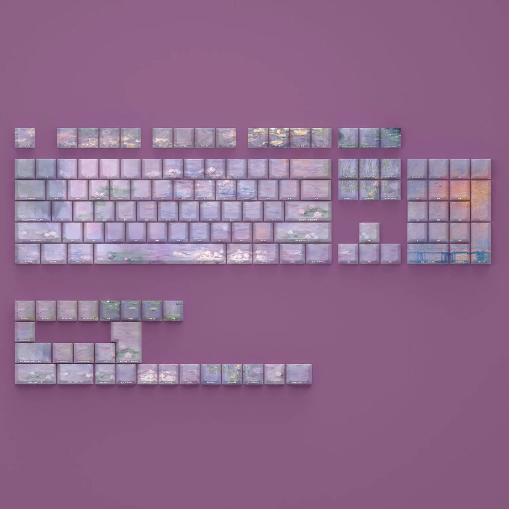 Set of white PBT keycaps with colourful water lily design on top and sides, showing side-engraved transparent characters.