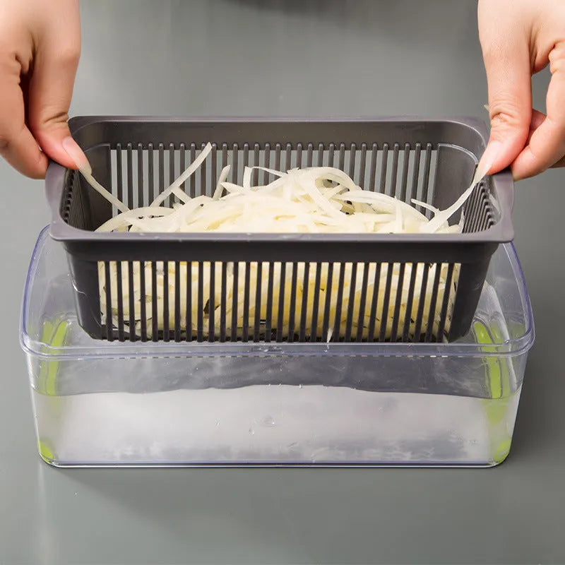 Multifunctional vegetable cutter with seven stainless steel blades on a kitchen counter