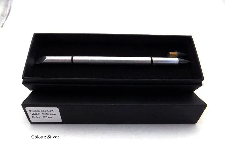 Silver inkless metal pen with alloy nib next to its storage box and spare nib.