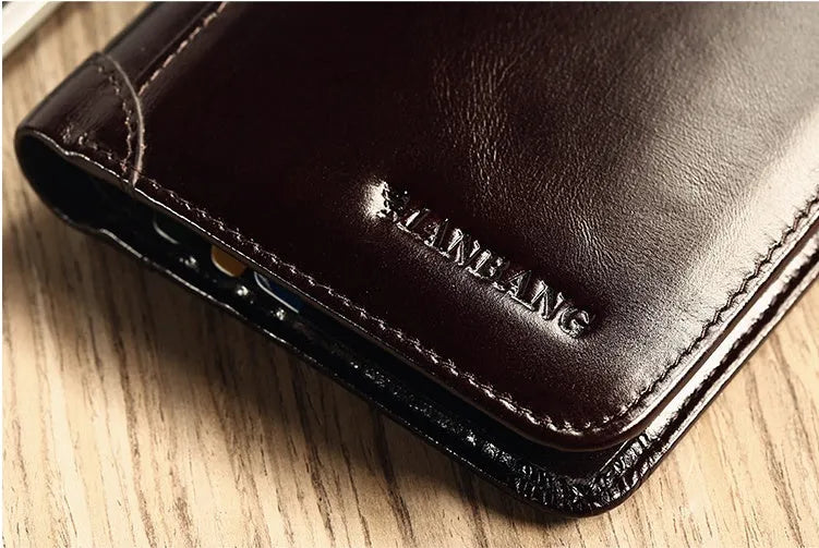 Men's black leather wallet open, showing internal card slots, photo slot, change pocket and hidden compartment.
