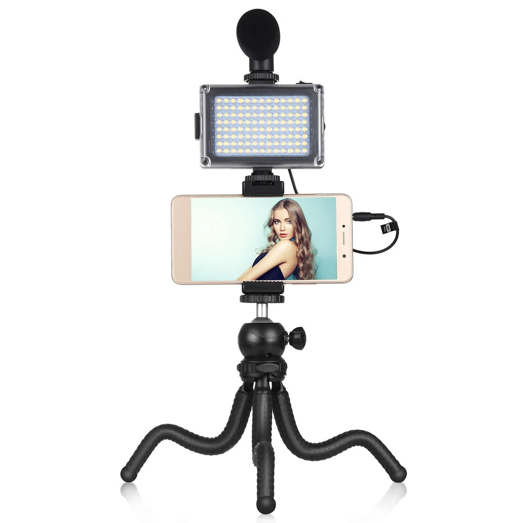 Octopus-style flexible tripod live broadcast kit with fill light and microphone accessories on a table