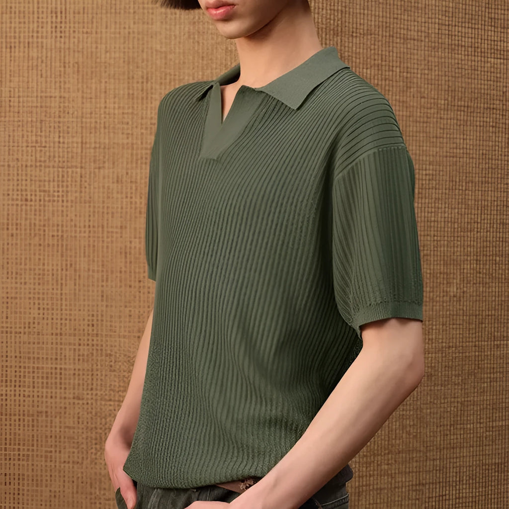 Man wearing a beige short-sleeve polo shirt with a striped collar, showcasing business casual summer style.
