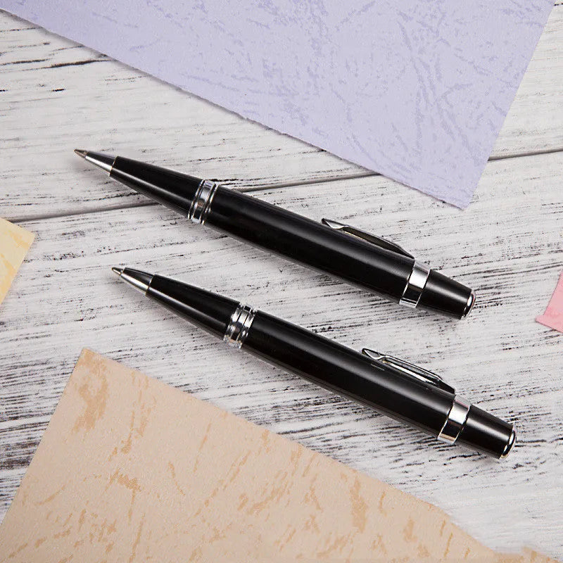 Short mini metal ballpoint pen with rotating mechanism, silver shell, and black ink, 112mm length