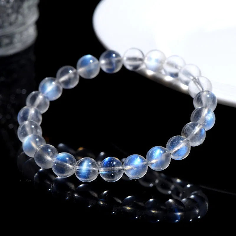 Natural cream body blue moonlight crystal bracelet in a minimalist unisex style.