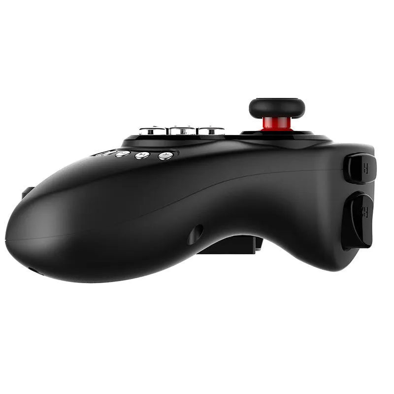 PG-9023 black telescopic wireless game controller holding a mobile phone