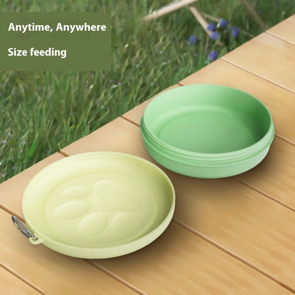 A collapsed and opened portable silicone dog bowl in a light pink colour, showing its flexible design.