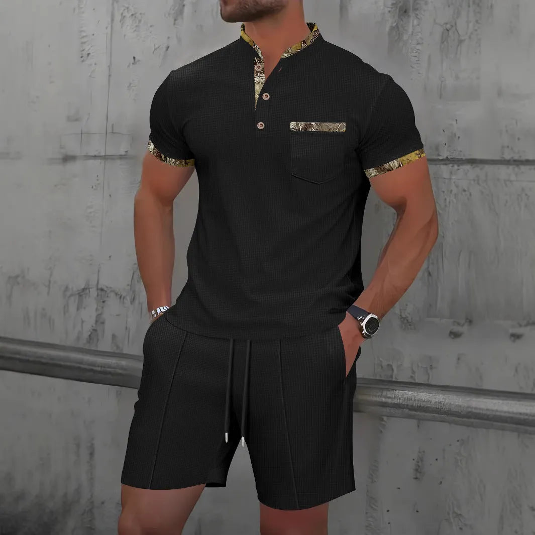 Men's grey short sleeve zip-front polo top and matching shorts on a hanger.
