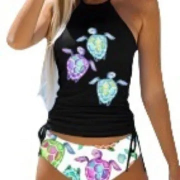 Conservative style women's swimsuit with colourful cartoon print and matching shorts.