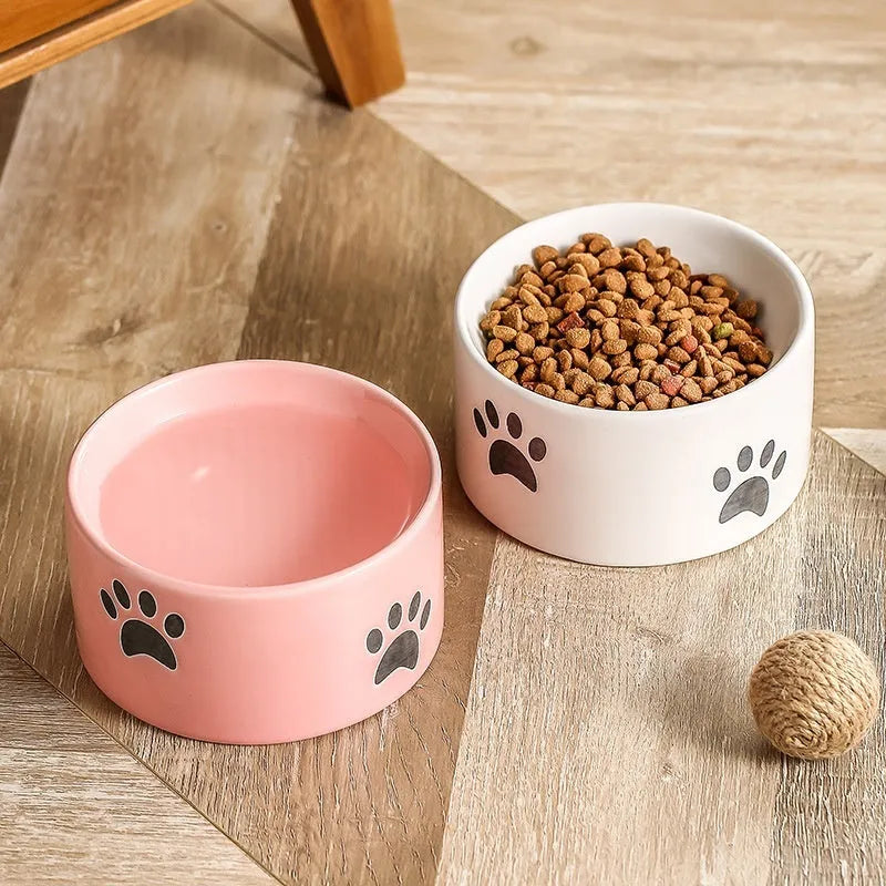 Ceramic cat bowl with high-footed design showing cat's paw decoration pattern in selected colour