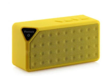 Cannon X3 cube-shaped portable Bluetooth speaker in black, blue, green, red, and yellow colour options.