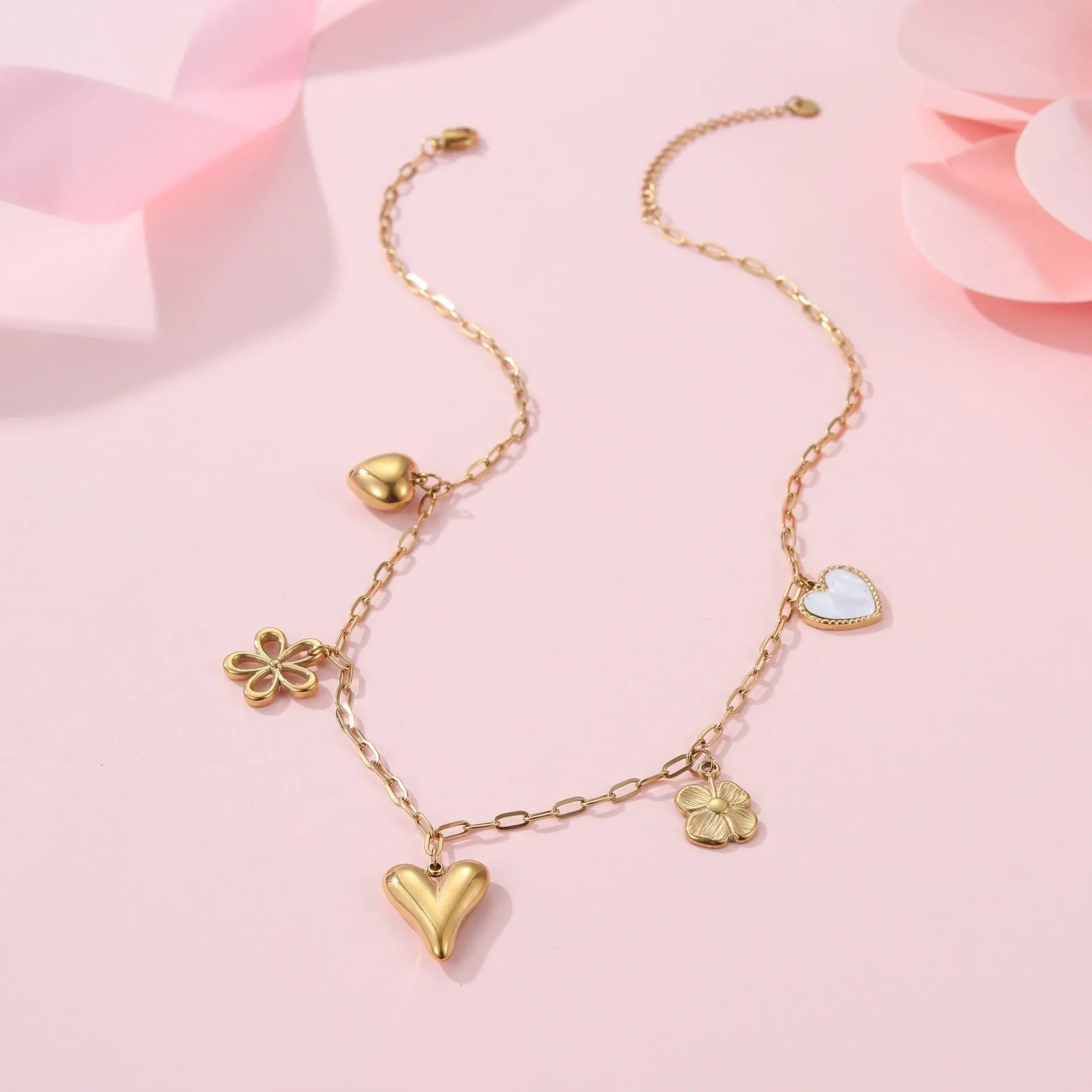 Geometric sun pendant necklace on stainless steel chain with 18K gold electroplated finish
